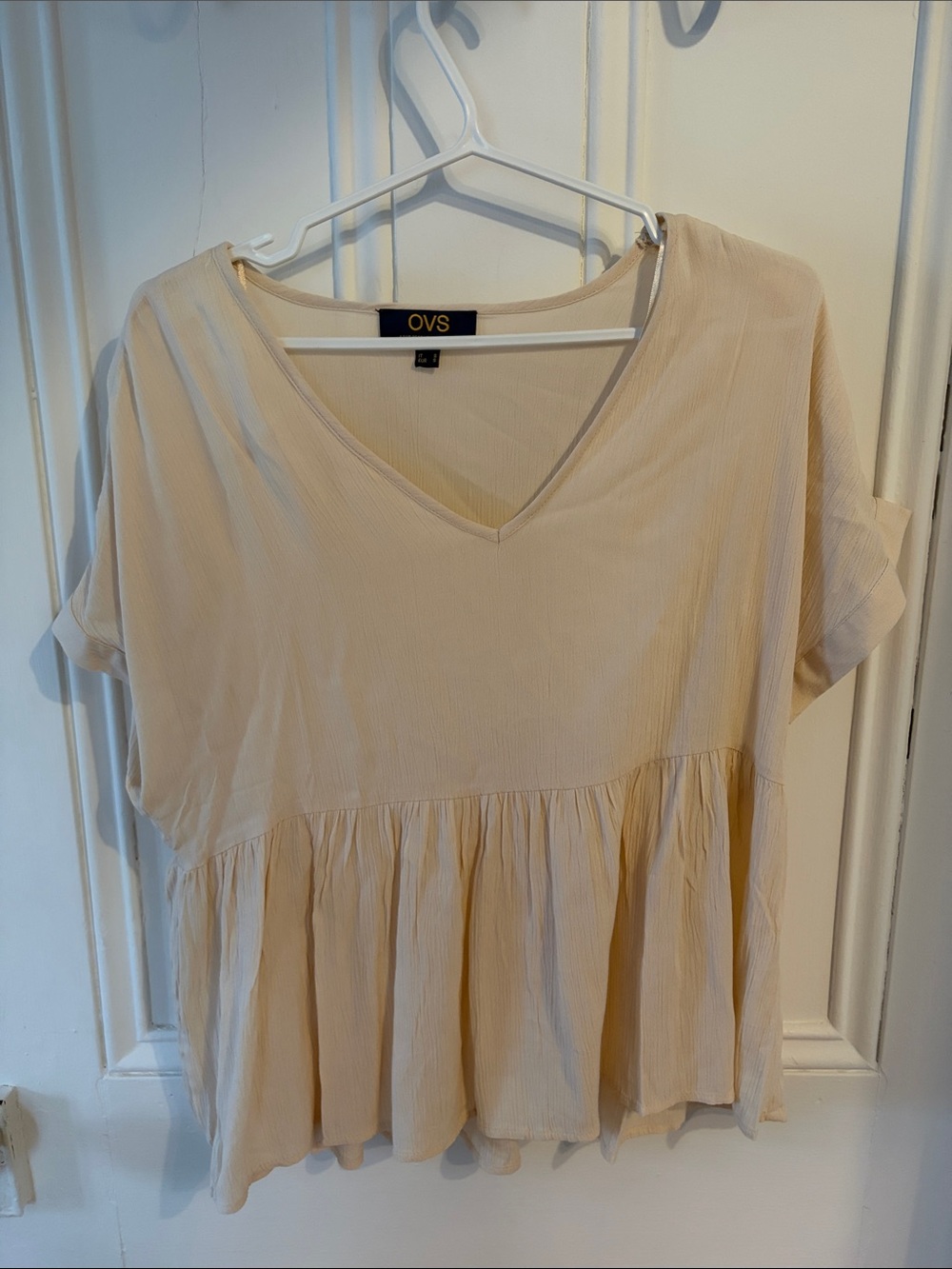 Cream V-Neck Peplum Blouse